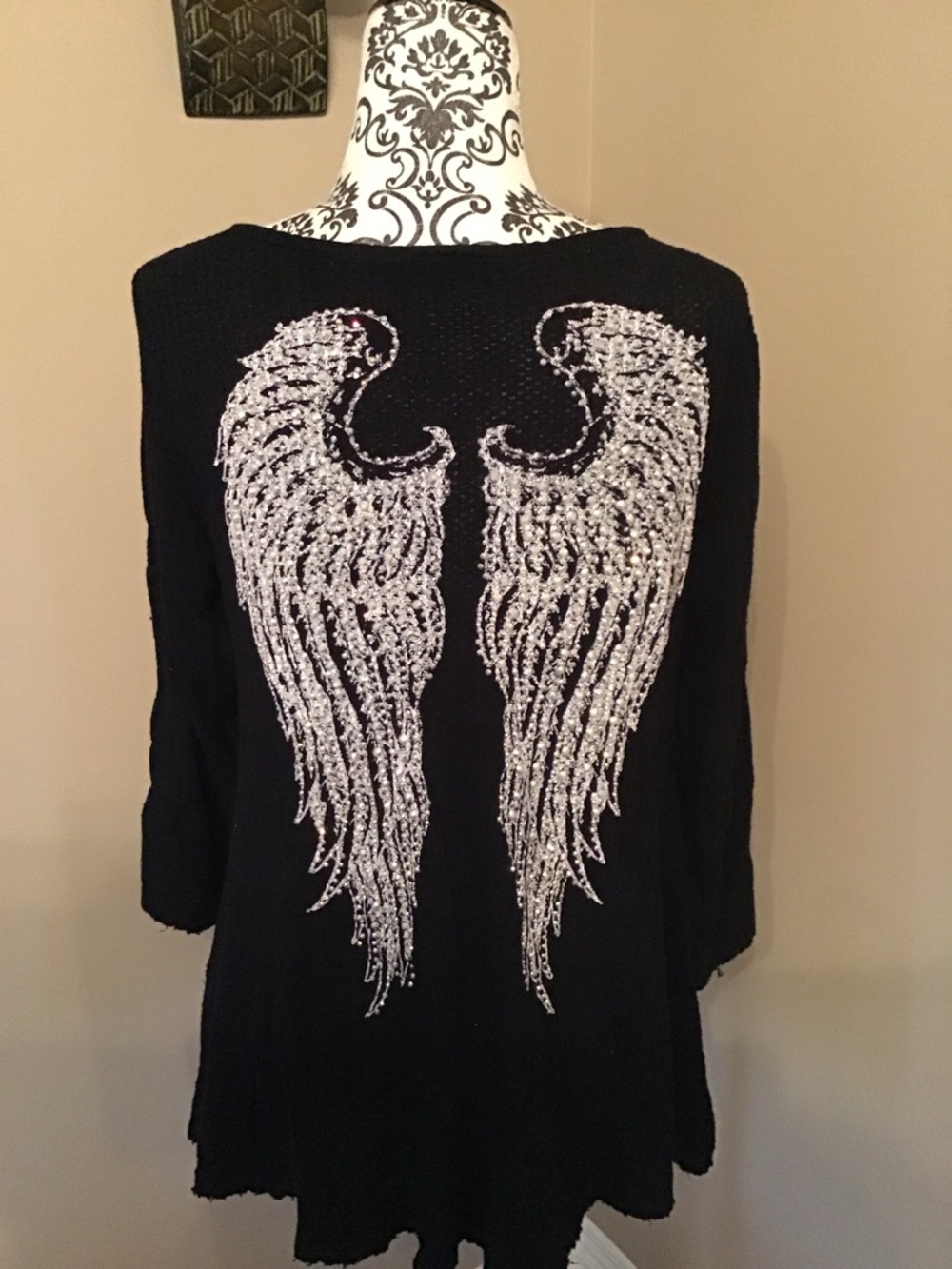 Long sleeve black top with crystal angel wings